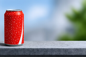 Red soda can with white speckles on textured surface blurred background beverage