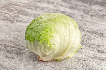 Raw iceberg salat over background