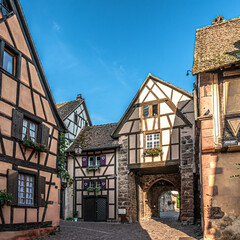 Timbered houses in the streets of Riquewihr - France