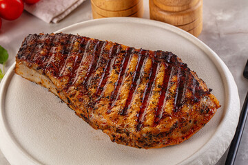 Grilled pork steak with bone