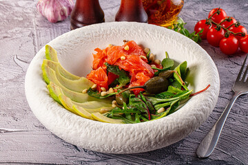 Dietary salad with salmon and avocado