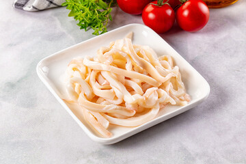 Canned marinated squid rings heap