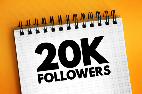 20K Followers - reaching 20,000 followers on a social media platform or other online platform, text concept on notepad
