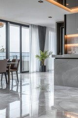 This elegant kitchen features a sleek island counter, stylish wall lighting, and a spacious dining area set against marble floor tiles. The large windows create a bright and inviting ambiance