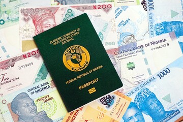Nigerian naira currency money bills and passport. The concept of travel and vacation