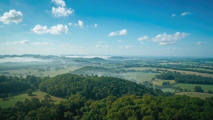 Fototapeta premium Bird's-eye perspective of rolling hills and scenic terrain during summer