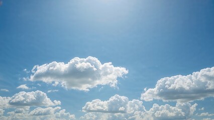 Blue Sky Highlighted by White Puffy Clouds, Textured Background of Sunny and Cloudy Weather, Soft Cumulus Cloud Patterns, Open Sky with Blank Area for Text