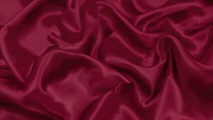 Fototapeta premium Undulating satin fabric in a luxurious burgundy tone with interplay of light and shadow