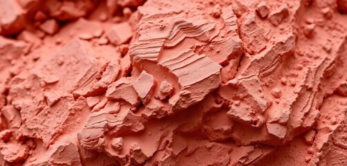 Close-up of rough, textured red sandstone, showing natural variations in color and grain,  brown,  detail shot