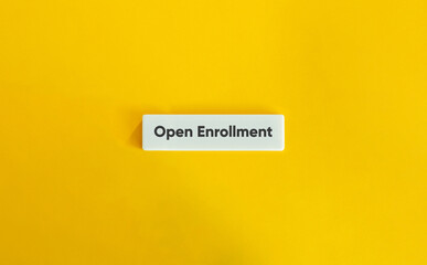 Open Enrollment Message on Yellow Background with Minimal Letter Tile Design