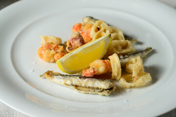 Fritto Misto del Golfo Fried Fish with Calamari, Prawns and Sardines Garnished with Lemon