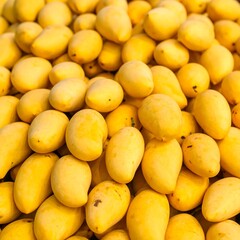 Pile of ripe yellow mangoes