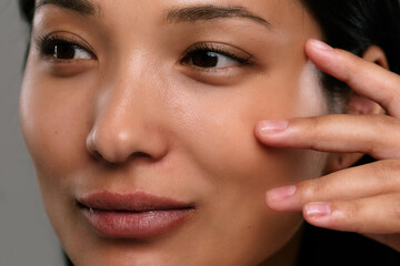 Close-Up of Woman Touching Smooth Healthy Skin