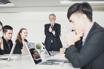Businesspeople planning with his team  brainstorm meeting for the ultimate success of the company in the office room.