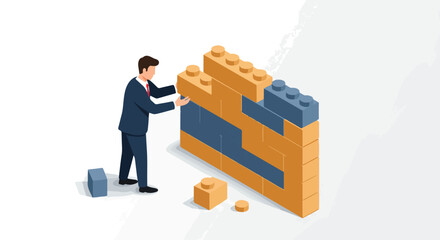 Man builds wall of toy bricks on white backdrop. Concept teamwork, strategy