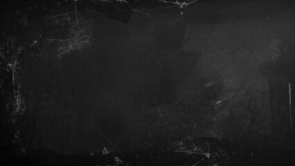 Grungy black textured background featuring dusty effects and retro film appearance, space available for your content