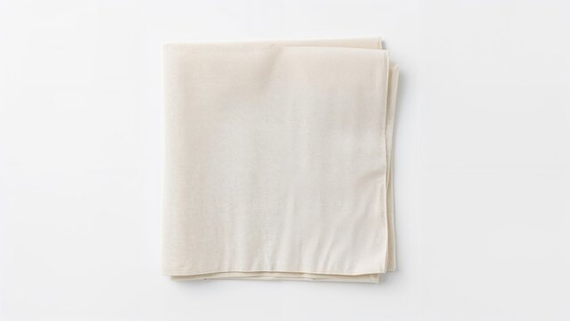 Neutral beige cloth napkin displayed on white