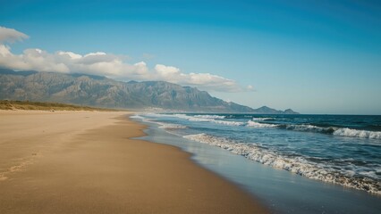 Breathtaking natural scene of sea, sand, and rugged mountains
