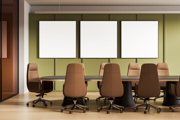 Modern conference room interior with blank framed poster mockups on green wall for creative advertising and layout design presentation concept. 3D Rendering