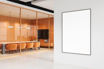 Plakat Blank framed poster on white wall near modern conference room with orange chairs and wood interior, clean minimalist office concept design mockup. 3D Rendering
