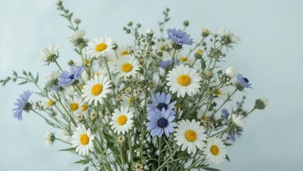 Fototapeta premium Charming bouquet of field flowers including chamomile and cornflower, summer nature theme, leaves, white and blue floral beauty, lush green