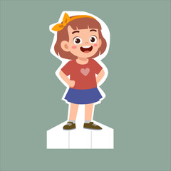 Cheerful cartoon girl with short brown hair, an orange bow, red heart shirt, and blue skirt, smiling happily. Cute character standing on a white base with a green background, perfect for kids designs