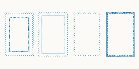 Collection of four decorative blue rectangular frames with scalloped edges and inner details