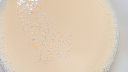 Creamy chai latte swirls conjure intimate hygge moments, rich Diwali warmth, and silky tranquility...