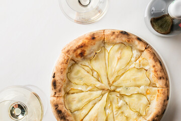 Gourmet pear pizza with delicate honey lace complements autumn equinox celebrations and Italian...