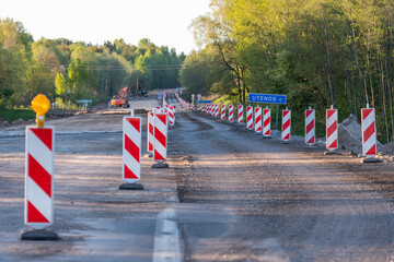 Vilnius–Utena road under reconstruction, undergoing repair or rebuilding, asphalting, with work...