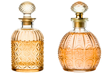 Two vintage glass perfume bottles with ornate stoppers and amber liquid isolated with transparent background