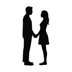 Silhouette of a couple holding hands and looking at each other