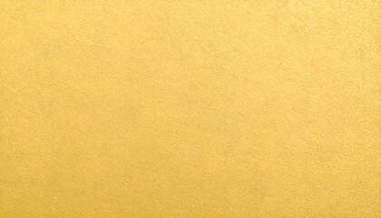 Fototapeta premium Gilded Radiance: A Textured Gold Surface with a Subtle Metallic Sheen