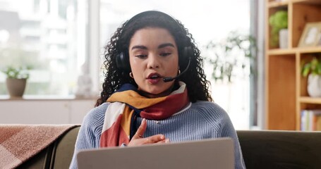 Woman, online meeting or video call with laptop for discussion or conversation on sofa in home. Female person, remote work or talking with computer, headset or mic for virtual chat or advice in house - Powered by Adobe