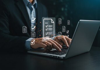 Businessman typing on a laptop, interacting with a holographic interface of digital checklists and documents.