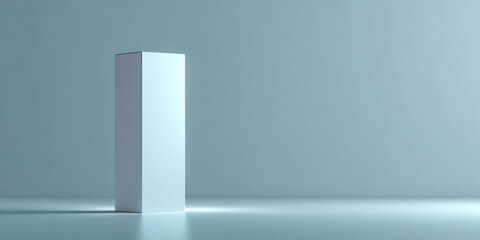 Minimalistic white box stands in spotlight against soft blue background, creating serene and modern atmosphere