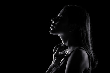 Womens with perfume bottle. Girl holding a perfume bottle. Beautiful girl using perfume. Woman with...
