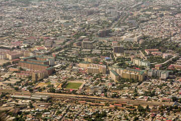 Modern part of Samarkand city seen from airplane during takeoff, Uzbekistan