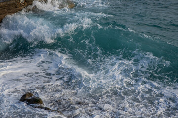 waves crashing on the rocks