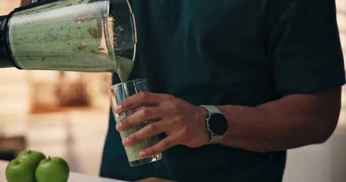 Hands, glass and pour green drink with blender, smoothie and container for liquid diet at apartment. Person, fruits and milkshake for wellness, nutrition or detox for gut health benefits at house