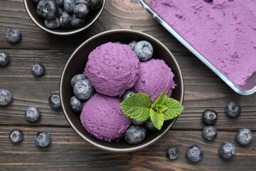 Tasty sorbet with blueberries and mint on wooden table, flat lay