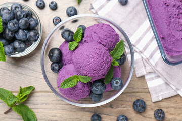 Tasty sorbet with blueberries and mint on wooden table, flat lay