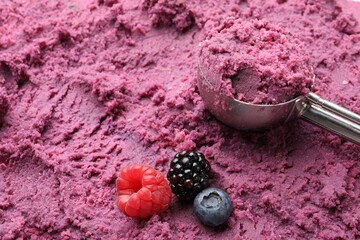 Delicious sorbet, fresh berries and scoop, closeup