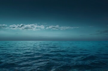 Obraz premium Vast Ocean Under Cloudy Sky in Deep Blue Tones with Calm Water and Overcast Atmosphere