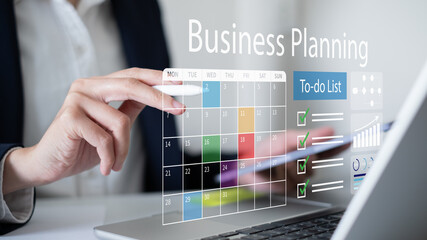 Professional entrepreneur businessman using calendar and checklist for business planning strategy to boost improve marketing sales data analysis
