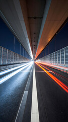 Long Highway at Night with Streaks of Light from Moving Traffic