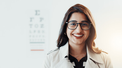 Happy woman, optometrist and portrait at clinic with glasses, career and chart for eyesight...
