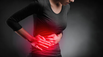 young woman suffering from stomach pain