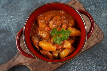 Chicken stew with potatoes in tomato sauce