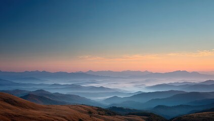 Fototapeta premium Misty mountain range at dawn (1)